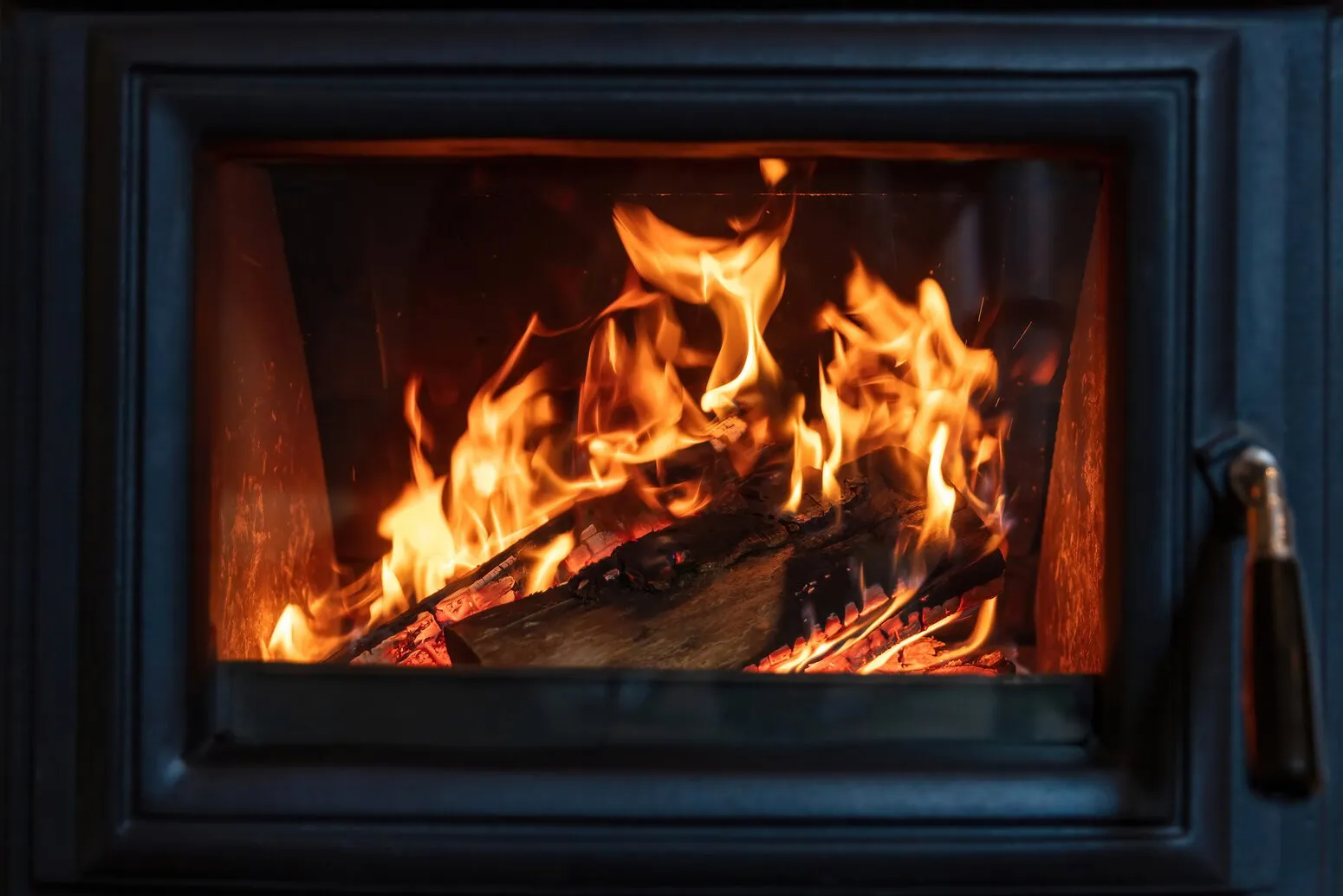 Burning fire in a wood stove